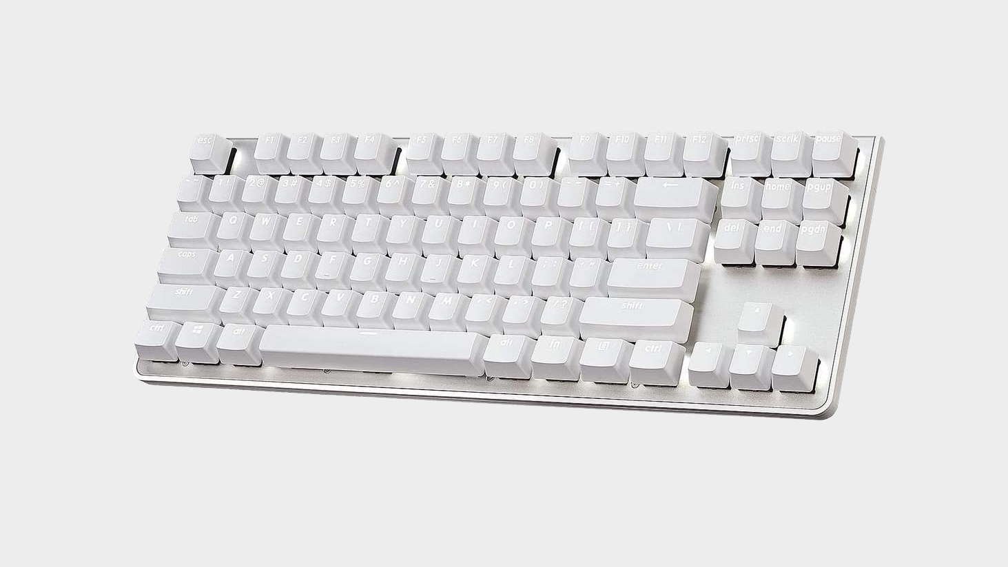 Image of the White G.Skill KM360 gaming keyboard on grey background.