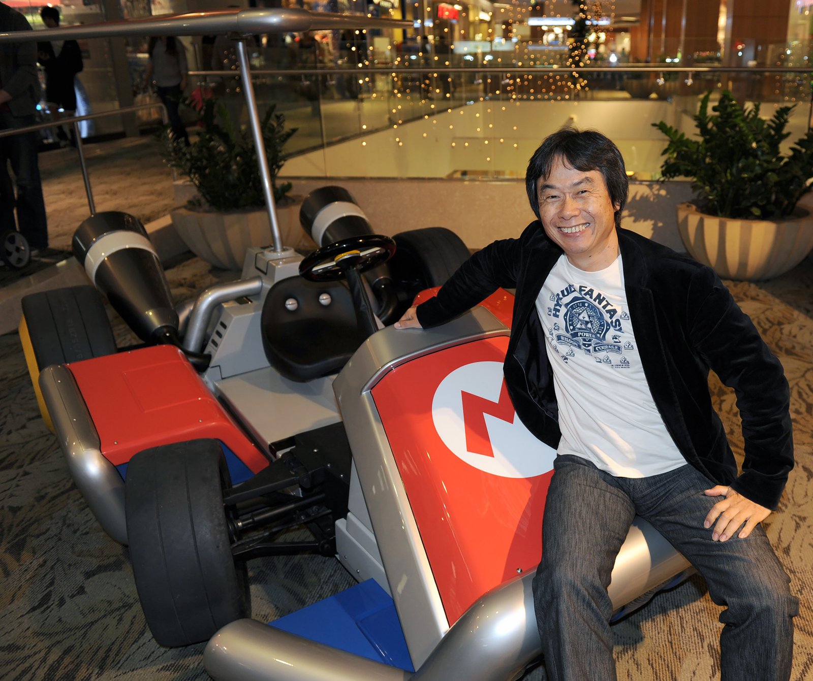 Shigeru Miyamoto in a kart.