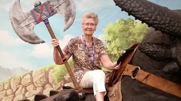 Elder Scrolls 6 - Shirley Curry holding a battle axe and riding a dragon