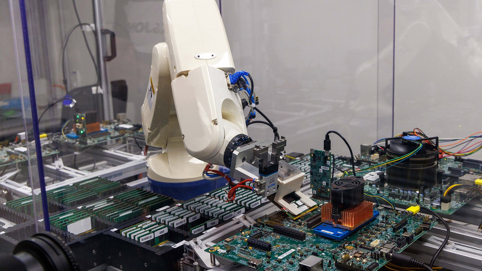 A robotic arm that fits RAM into a test system at Intel IDC.