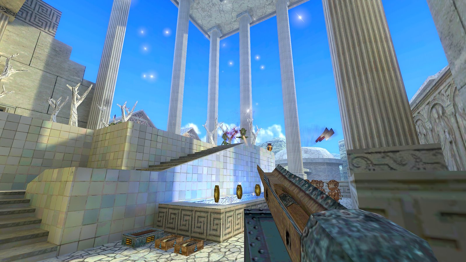 player looking up at doric columns with mountains in background